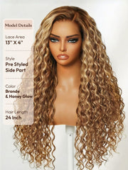 A mannequin head displays a long, wavy honey blonde 13x4 lace front 24 inch wig with a pre-styled side part in a blonde and honey glow color.
